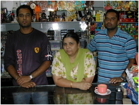 Gurmeet Singh's family at their retail shop 