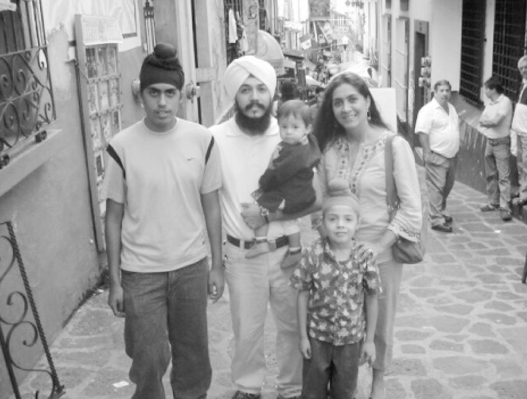 Gurusewak Singh, a 3HO follower with his family